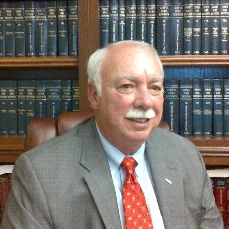 JAMES E. JIM WALKER an attorney taking a picture